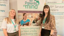 Volunteers at a NCT Parents in Mind promotional stand